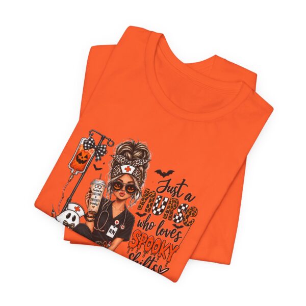 6066067926545792031_2048.jpeg Halloween Nurse T-Shirt — "Just a Nurse Who Loves Spooky Shift(s)" Graphic Tee